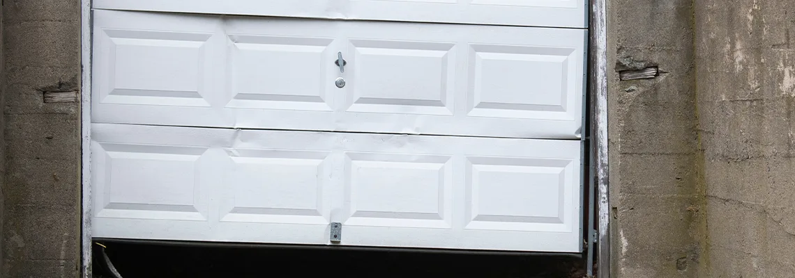 Garage Door Got Hit By A Car Dent Removal in Halifax, NS